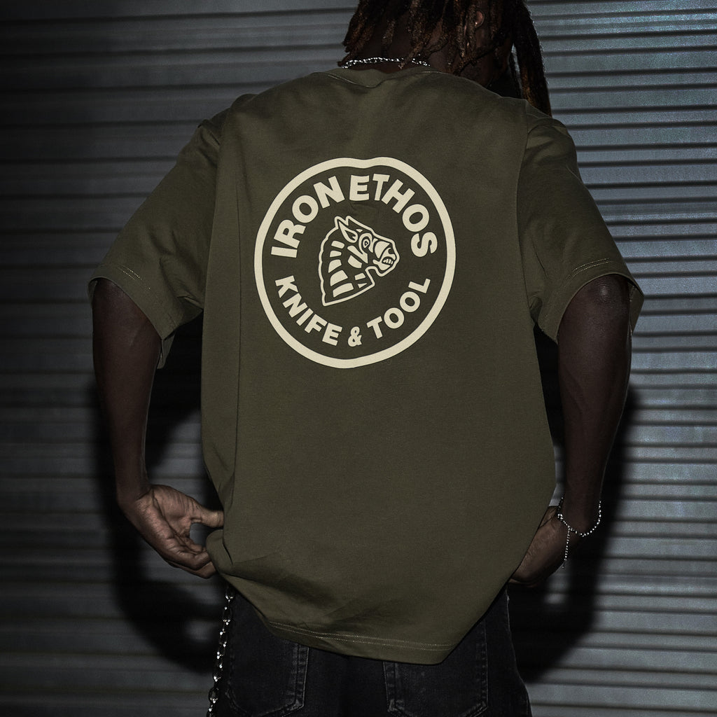 Iron Ethos Emblem Tee in Khaki Green: Back View of Model Wearing the Shirt
